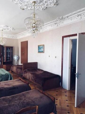 Фото номера Cемейный номер с собственной ванной комнатой Гостевой дом Guesthouse Raisa г. Кварели 12