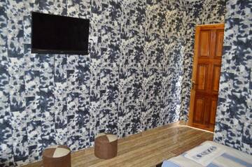 Фото номера Двухместный номер с 2 отдельными кроватями и душем Хостелы Hotel E U R O P E г. Кварели 5