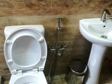 Фото номера Двухместный номер с 2 отдельными кроватями и собственной ванной комнатой Мини-отель Guest House Kakheti г. Кварели 11