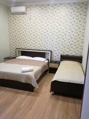 Фото номера Трехместный номер с собственной ванной комнатой Мини-отель Guest House Kakheti г. Кварели 5